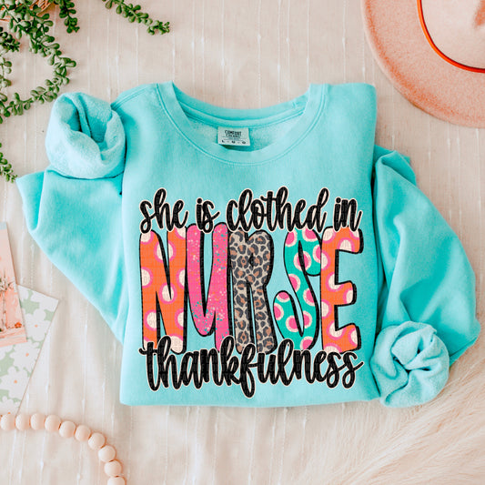 She Is Clothed In Thankfulness Nurse-Lovie T Designs